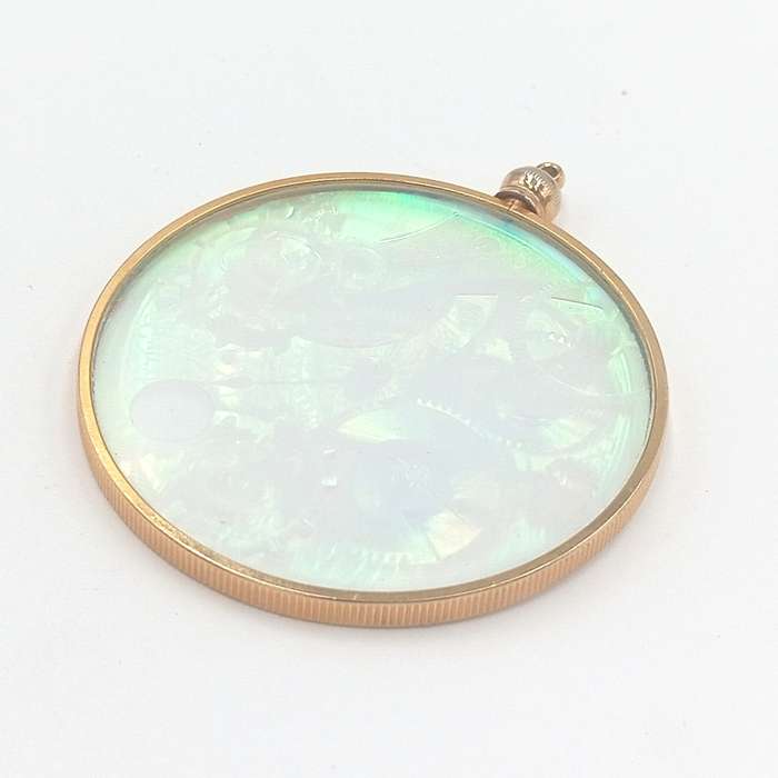 Vintage Hologram pendant with The Laser pendant story