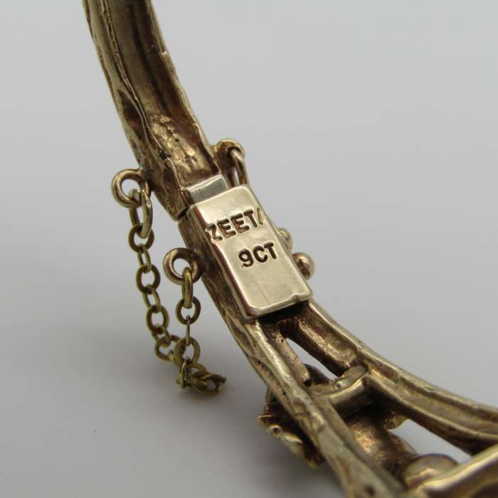 Vintage Zeeta 9kt Gold Amethyst and seed pearl bangle - weighs 22,4 grams - size 17 cm