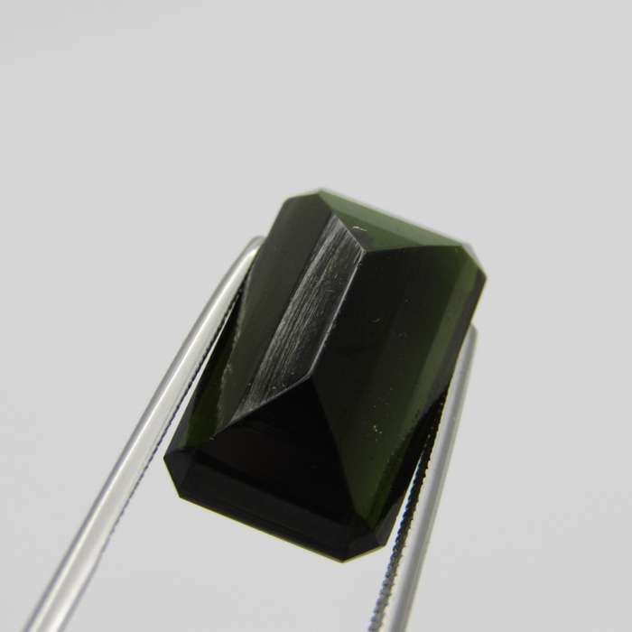 Dark toned green Tourmaline Emerald cut - large 16,8 carat stone with Gemlab certificate