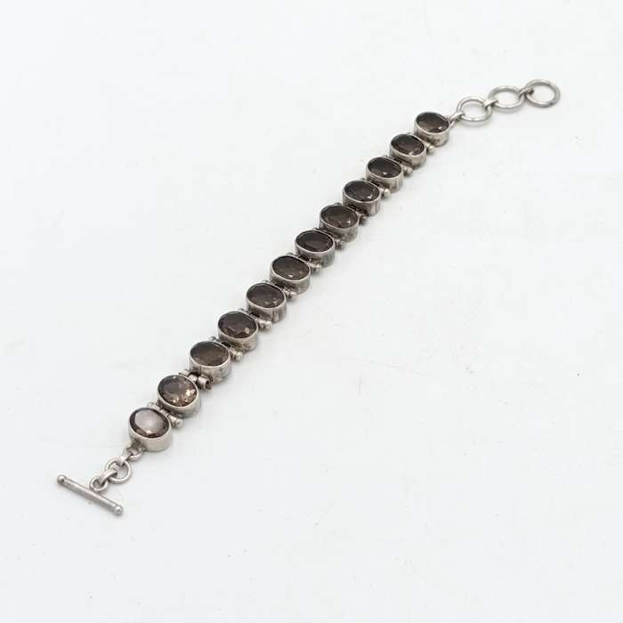 Sterling Silver Agenta bracelet with 12 smokey quarts stones of about 3 carat each - size 19cm long