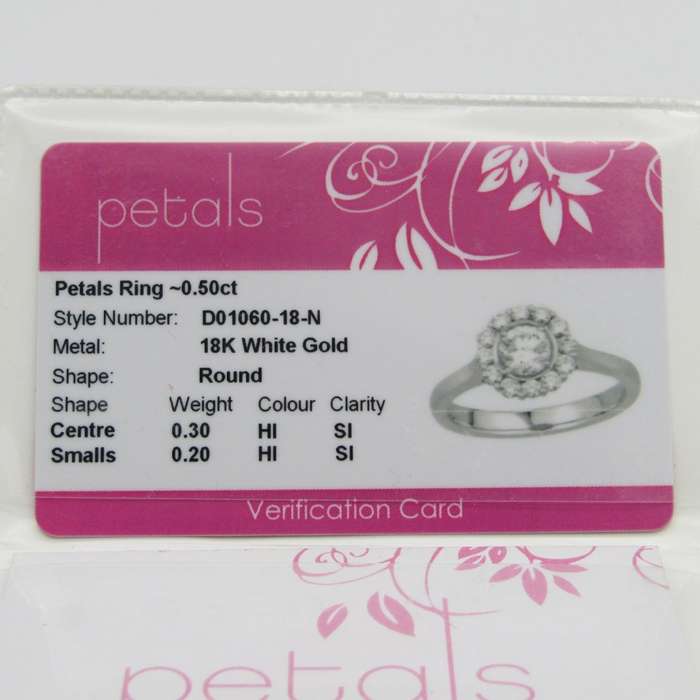 18kt White Gold Petals ring with 0,30ct diamond surrounded by 12 smaller diamonds