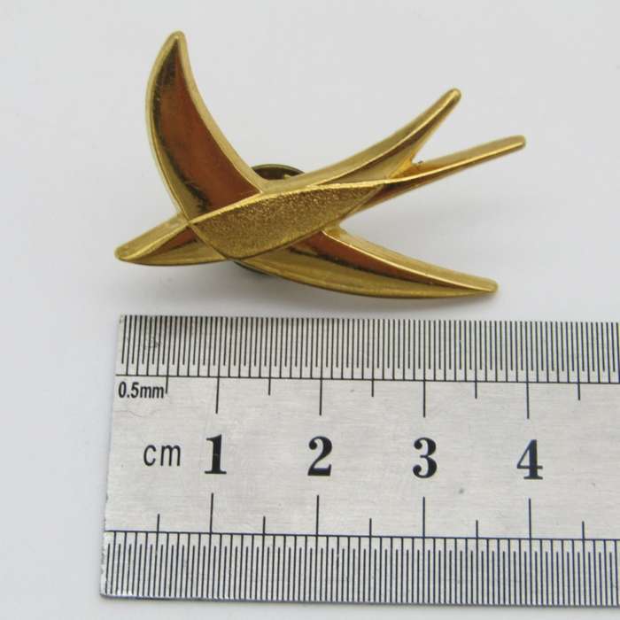 Pair of South African Postal Speed Services pin badges
