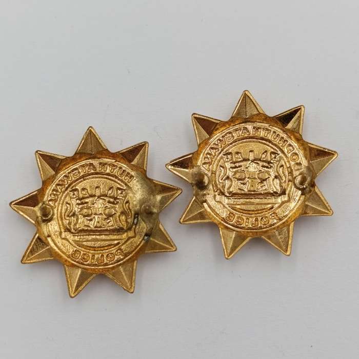 Pair of Bophuthutswana Police collar badges