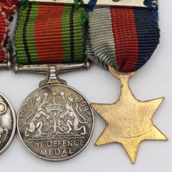 Set of 4 WW2 miniature medals with mentioned in despatched oak leaf
