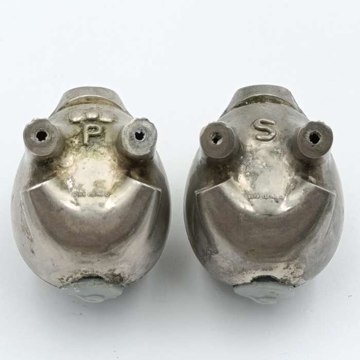 Pair of metal Piggy salt and pepper shakers