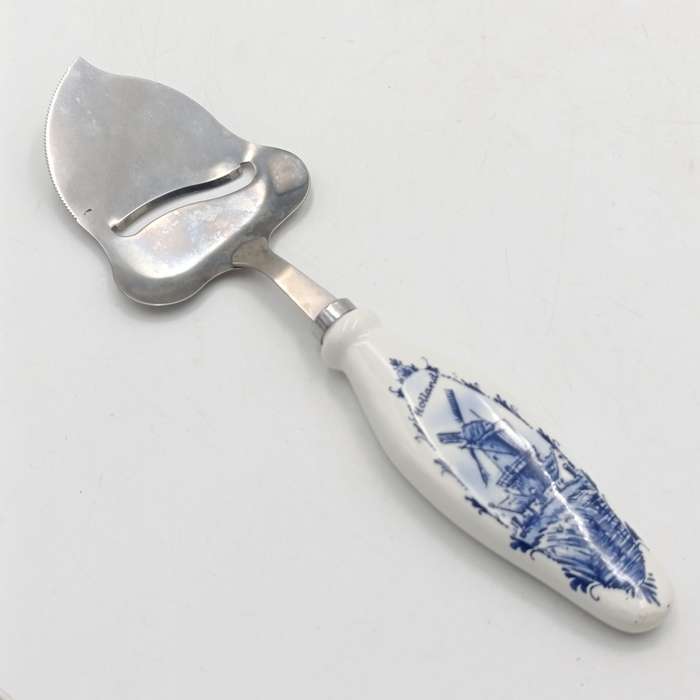 Vintage Cheese cutter with porcelain Holland handle