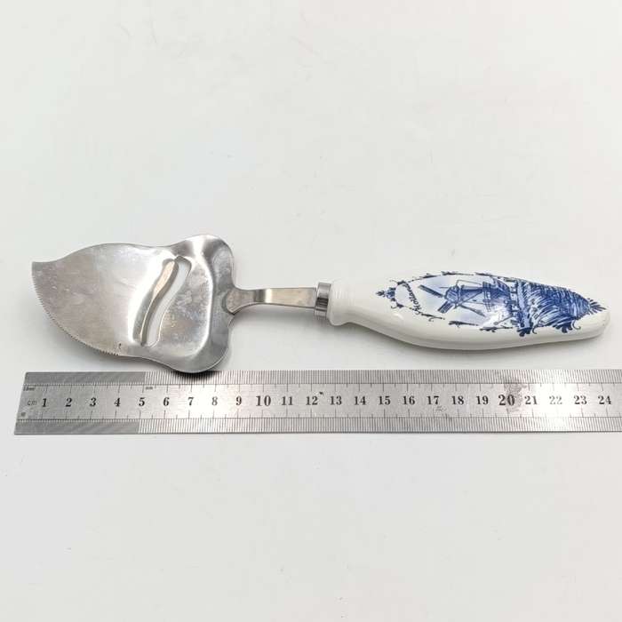 Vintage Cheese cutter with porcelain Holland handle