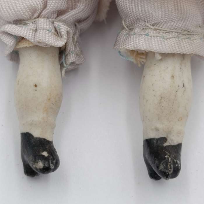 Antique blond hair rosy cheeks bisque doll - late 1800's - 17cm long