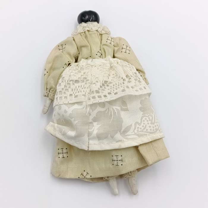 Dark hair rosy cheeks antique doll - 17cm long
