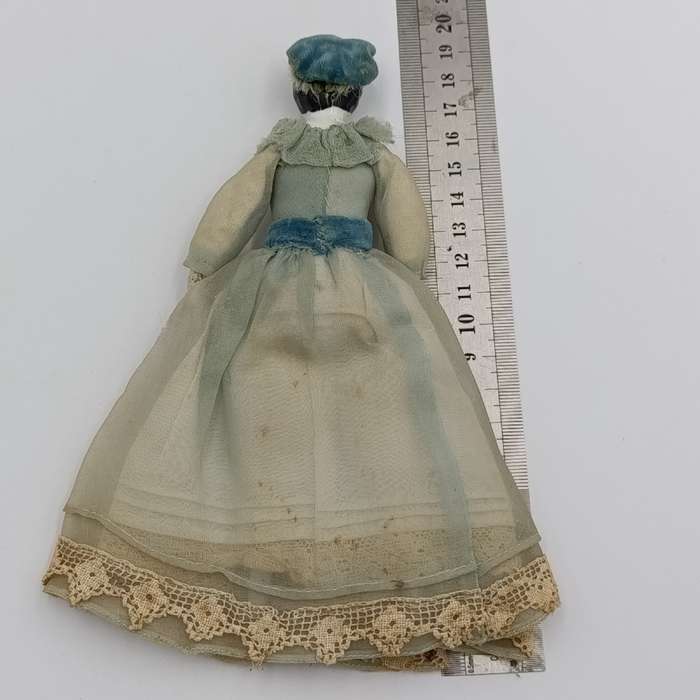 Antique Brown hair rosy cheeks German doll with hat - late 1800's - 18cm long