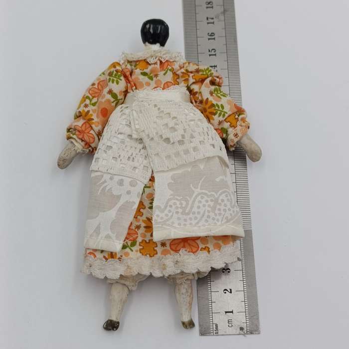 Late 1800's German dark hair rosy cheeks antique doll - 15cm long