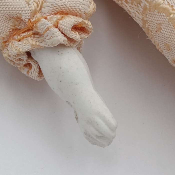 Antique brown hair rosy cheeks doll - 21cm long - late 1800's