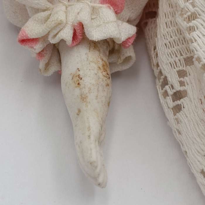 Antique blue eyes rosy cheeks dark brown hair doll - late 1800's - 21cm long