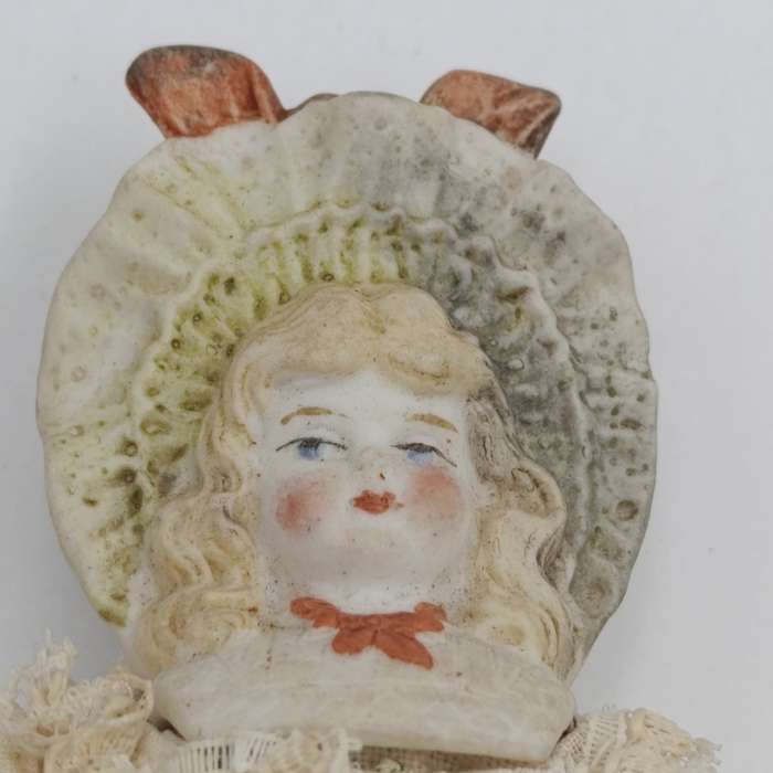 Antique Bisque doll - 21cm long - blonde hair