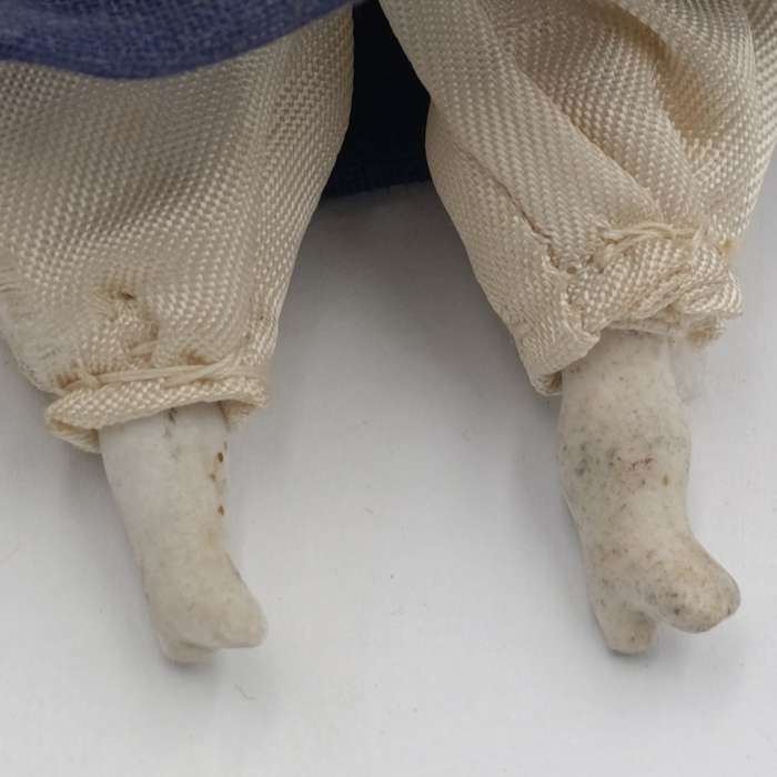 Dark hair rosy cheeks antique doll - 17cm long