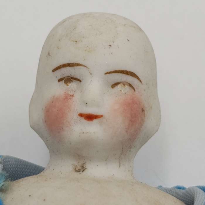 Antique rosy cheeks doll - bisque - late 1800's - small chip