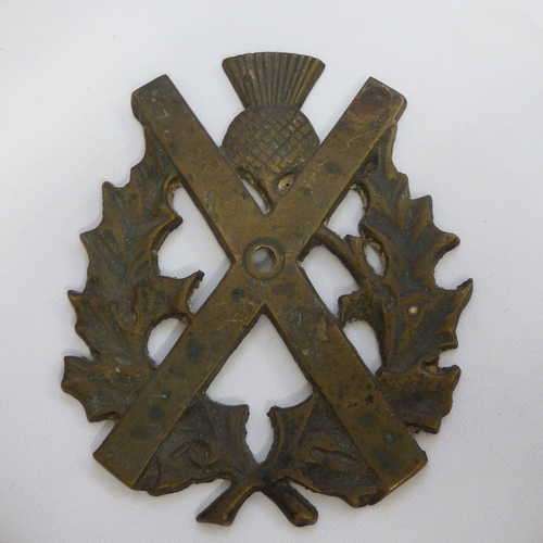 Old Brass Scottish Highlanders plaque badge