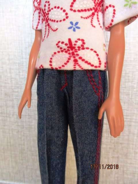 Barbie doll plus two sets of clothing - brown hair