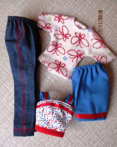 Barbie doll plus two sets of clothing - brown hair