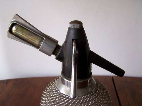 soda siphon  ... not old but very cool for your bar !!!