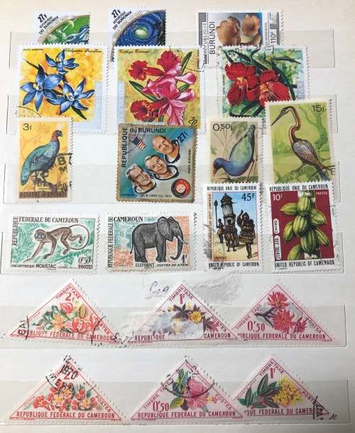 African stamps in album,