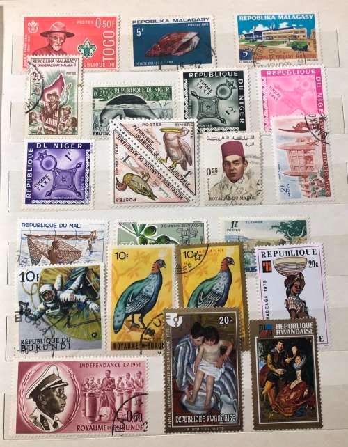 African stamps in album,