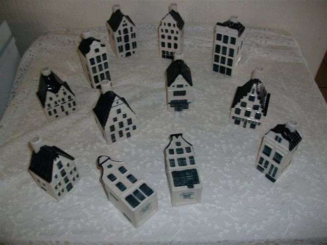 A collection of 12 klm delft houses for the collector not sealed