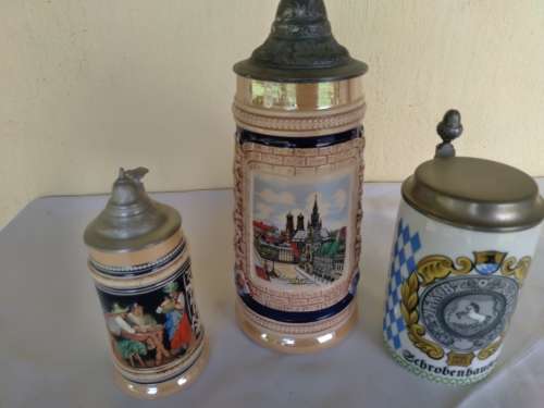 A lot of three collectable stain  mugs