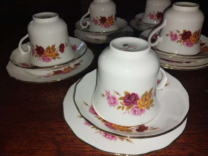 A set of five queen Anne tea cup trios