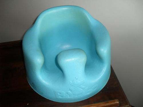 A BUMBO SEAT -for baby made in South Africa. -to use in Bath, on the floor, outside on grass....