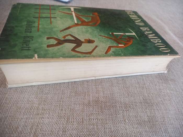 Behind Bamboo : An Inside Story of the Japanese Prisoner of war camps