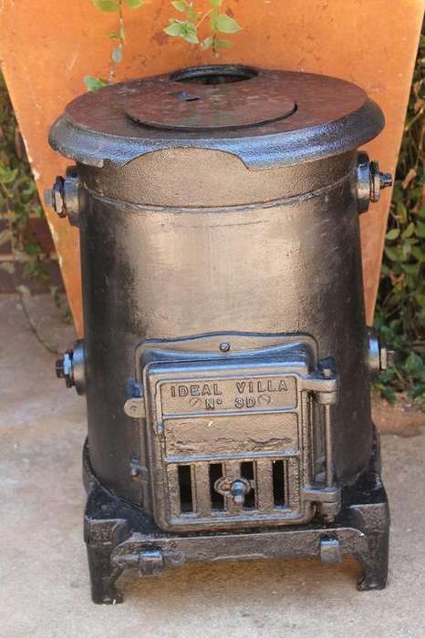 COAL STOVE/WATER WARMER (CAST IRON)