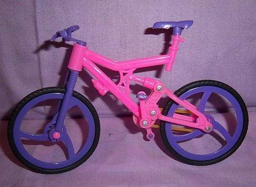 A PINK BICYCLE FOR A DOLL