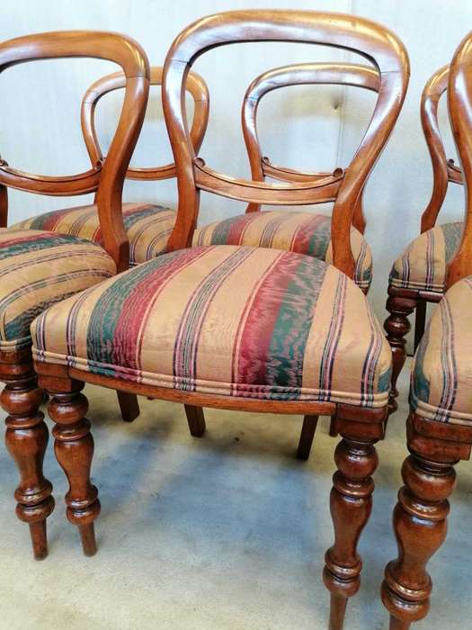 A set of 6 Mahogany Balloon back chairs