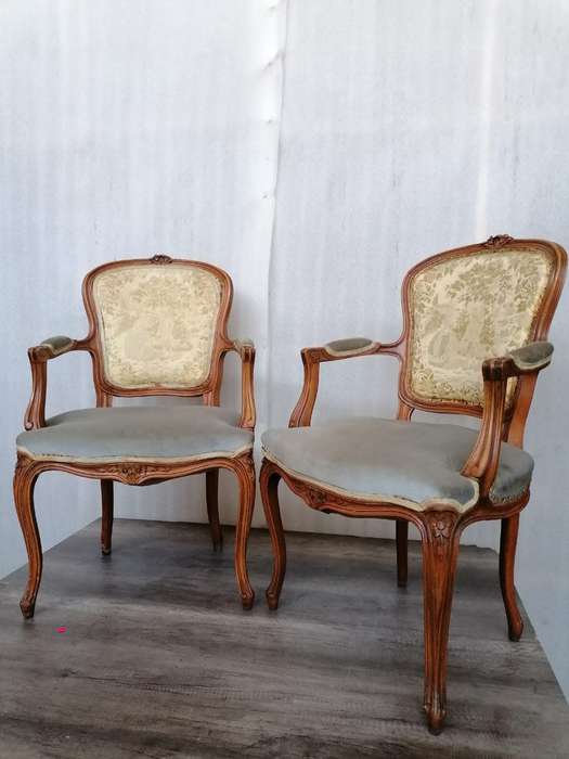 A Pair of Oak Louis XV Style chairs