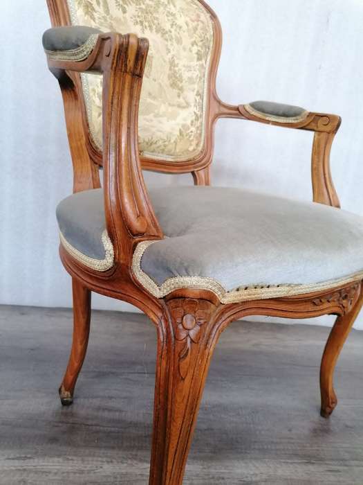 A Pair of Oak Louis XV Style chairs