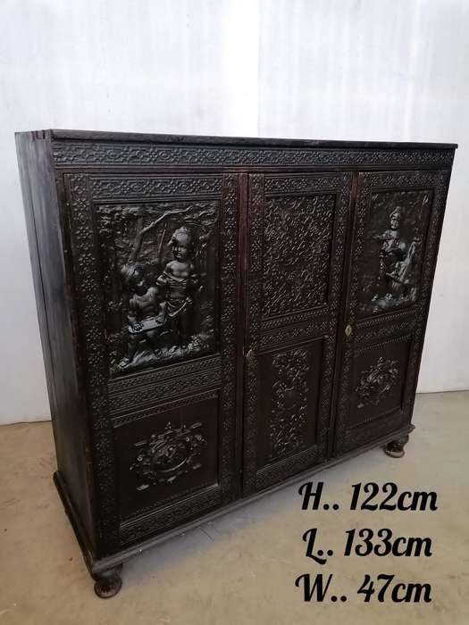 A 19th century German cabiet with beautiful Repoussè leather doors