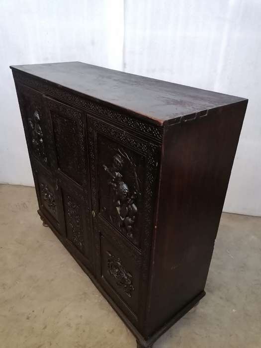 A 19th century German cabiet with beautiful Repoussè leather doors
