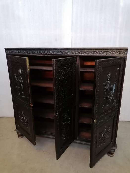 A 19th century German cabiet with beautiful Repoussè leather doors