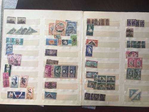 ALBUM OF HUNDREDS OF MIXED STAMPS- SEE PICS