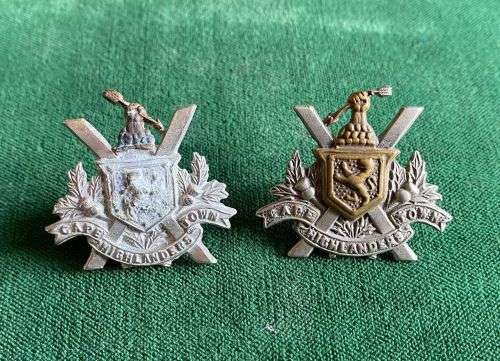 CAPE TOWN HIGHLANDERS,BI METAL COLLAR BADGE PAIR-WORN POST 1902-(ONE OF THE BADGES-NOT IN GOOD CONDI