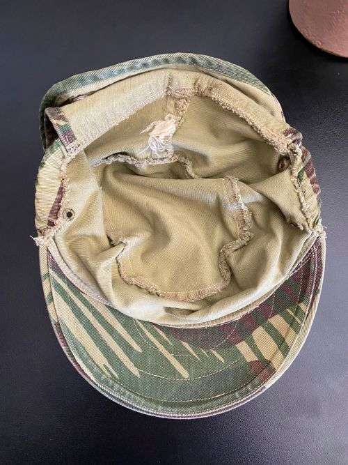 RHODESIAN CAMO FLAP CAP-SIZE 56 -USED BUT GOOD CONDITION