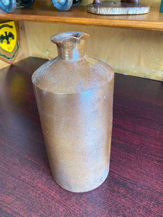 VERY LARGE WATT & LOVETT STONEWARE INK,BOTTLE WITH POURING LIP-GOOD CONDITION-DIAMETER AT BOTTOM 110