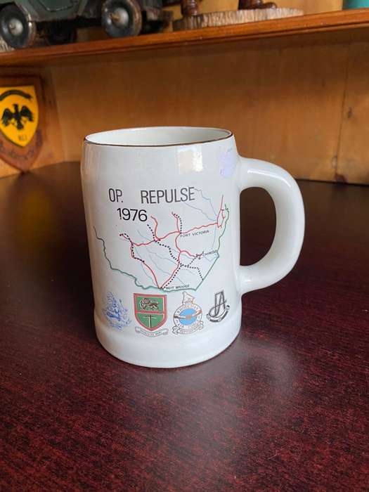 RHODESIAN OP REPULSE 1976 MUG NORBEL POTTERIES MAKERS STAMP-HEIGHT 13 CM-GOOD CONDITION WITH NO DAMA