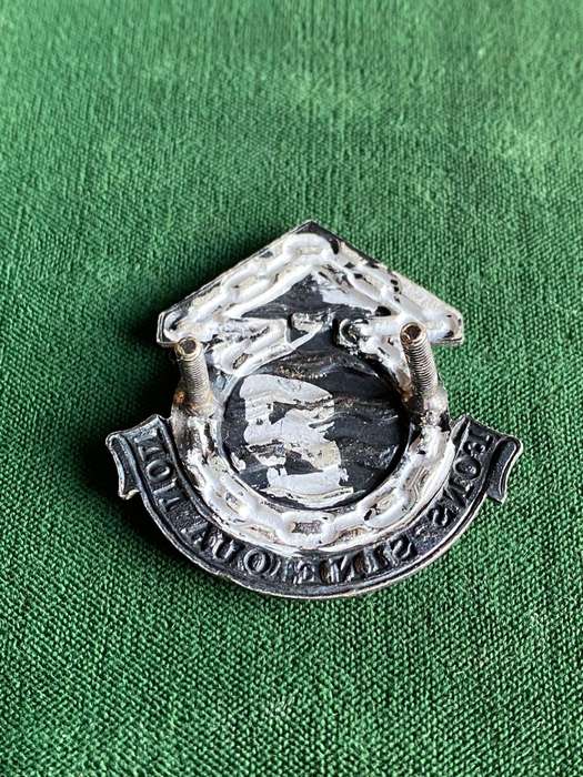 ORDNANCE SERVICES CORPS,CHROME AND ENAMEL CAP BADGE-APPROVED IN 1977-FIRST TYPE-2X SCREW LUGS