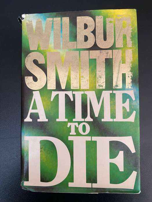 WILBUR SMITH-A TIME TO DIE-HARDCOVER WITH DUST COVER-FIRST EDITION PUBLISHED 1989