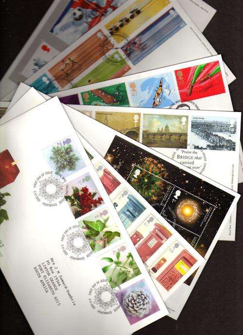 GREAT BRITAIN 2002 COMPLETE SET OF 14 COMMEMORATIVE FIRST DAY COVERS. CAT 121,75 POUNDS.