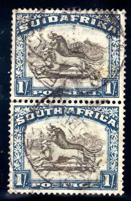 SOUTH AFRICA 1930-45 1/- BROWN & BLUE UPR WMK VERT PAIR USED. SACC 49. CAT R500 FOR HORIZONTAL PAIR.