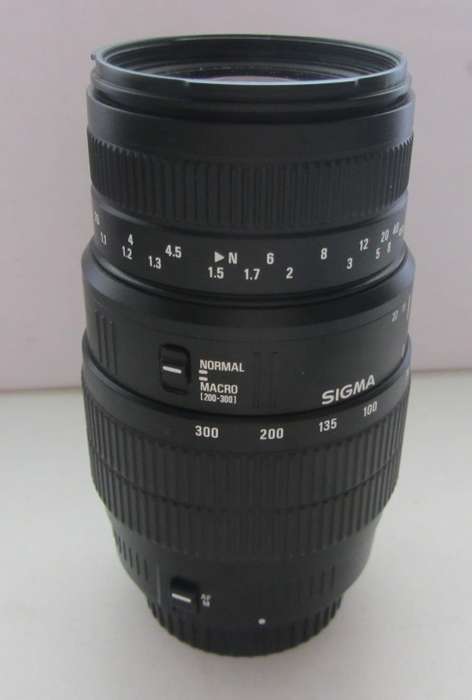 Sigma 70-300mm f1.4-5.6 Macro Lens-For Canon EOS Diginal Camera-Good Condition..Incl Marumi UV Haze