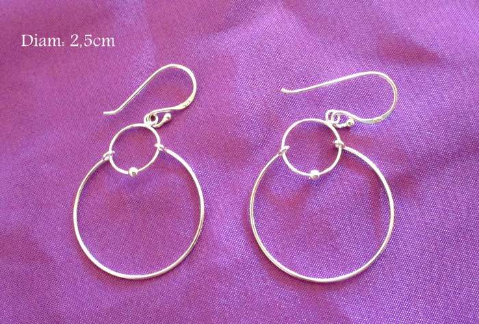 A PAIR OF SOLID SILVER EARRINGS---NEW